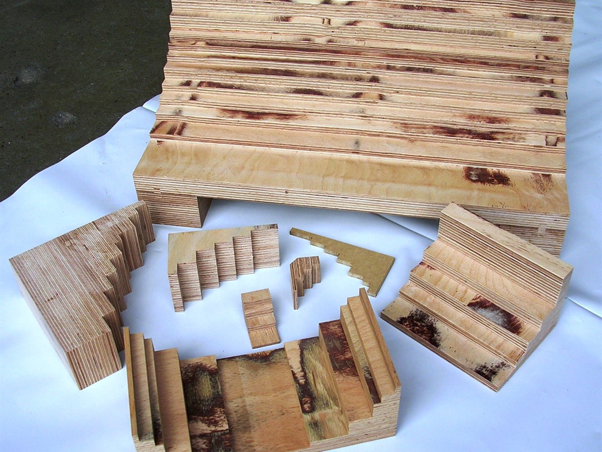Insulating components in laminated wood