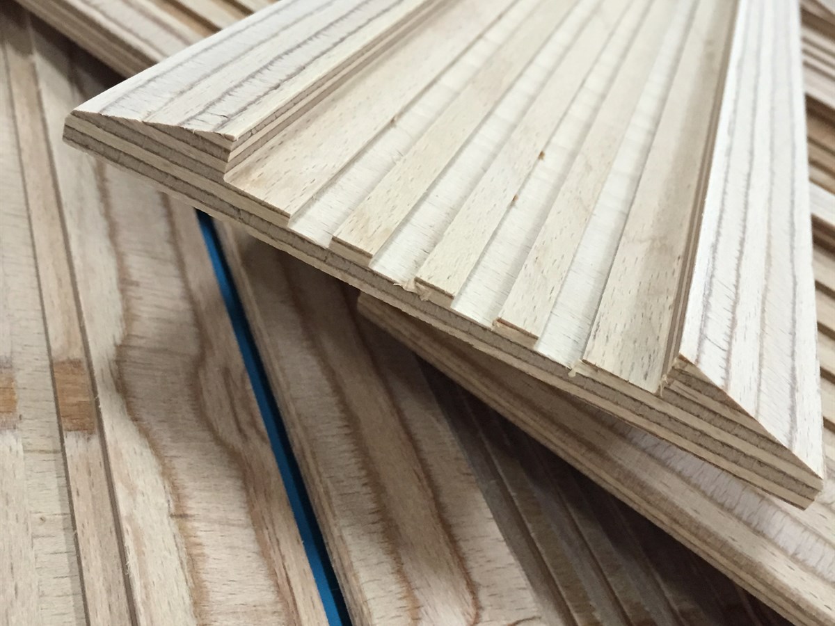 Insulating components in laminated wood